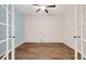 Bright office space featuring warm wood floors and stylish french doors, perfect for a home workspace at 2303 Angus St, Mead, CO 80542