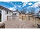 View from deck showing backyard, wooden fence and part of house at 8152 S Everett St, Littleton, CO 80128