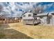 Back of house, deck, fenced yard at 8152 S Everett St, Littleton, CO 80128