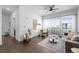 Bright living room featuring modern decor, wood floors, and an open layout at 2525 Arapahoe St # Rd315, Denver, CO 80205