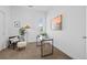 Bright office with desk, chair, and artwork, perfect for working from home at 2525 Arapahoe St # Rd315, Denver, CO 80205