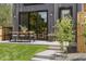 Backyard patio with table and chairs perfect for outdoor dining at 2395 N Emerson St, Denver, CO 80205
