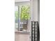Cozy balcony with a comfortable wicker chair, perfect for relaxing outdoors at 2395 N Emerson St, Denver, CO 80205