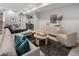 Basement with inviting seating area and a modern wet bar for entertaining at 2395 N Emerson St, Denver, CO 80205