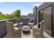 Outdoor rooftop deck with comfortable seating and a fire pit for relaxation at 2395 N Emerson St, Denver, CO 80205