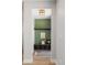 Clean entryway with bench, storage, and shelving at 2395 N Emerson St, Denver, CO 80205
