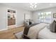 Bright bedroom featuring a modern ensuite bathroom and a private balcony at 2395 N Emerson St, Denver, CO 80205