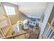 View of the foyer featuring hardwood floors, a staircase, and a glimpse into the living room at 529 Olympia Ave, Longmont, CO 80504