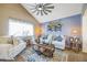 Inviting living room with vaulted ceilings, abundant natural light, and stylish decor at 529 Olympia Ave, Longmont, CO 80504