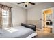 Cozy bedroom with a comfortable bed and natural light, creating a relaxing and inviting space at 11602 Pine Canyon Dr, Parker, CO 80138