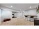 Spacious finished basement featuring a recreation area, a bar, and a treadmill area at 2980 E 135Th Dr, Thornton, CO 80241