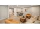 Finished basement with bar, living area, neutral carpet, and stylish decor with plenty of entertaining space at 2980 E 135Th Dr, Thornton, CO 80241