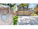 Traditional two-story home with brick accents, lush lawn, and mature trees at 2980 E 135Th Dr, Thornton, CO 80241