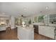 Bright kitchen featuring stainless steel appliances, granite countertops, and eat in dining space at 2980 E 135Th Dr, Thornton, CO 80241