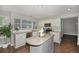 Beautiful kitchen featuring granite countertops, stainless steel appliances, and white cabinets at 2980 E 135Th Dr, Thornton, CO 80241
