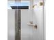 Bathroom shower featuring white subway tile with a gray tone mosaic tile accent stripe and bronze fixtures at 6244 N Lisbon St, Aurora, CO 80019