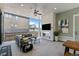 Cozy outdoor living space with a fireplace and comfortable lounge furniture at 6244 N Lisbon St, Aurora, CO 80019