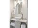 Modern bathroom vanity features a vessel sink, stylish faucet, and convenient towel storage at 1232 Wabash St, Denver, CO 80220