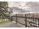 Relaxing balcony area features city views, black metal railings, and outdoor seating area for entertaining guests at 300 S Lincoln St, Denver, CO 80209