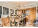 Dining room featuring built-in cabinetry and a rustic wooden dining table at 300 S Lincoln St, Denver, CO 80209