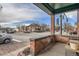 Inviting front porch with brick accents, offering a charming view of the bustling neighborhood intersection at 300 S Lincoln St, Denver, CO 80209