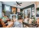 Cozy living room with fireplace, hardwood floors, and comfortable seating at 300 S Lincoln St, Denver, CO 80209