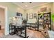 Home office provides large desk, comfortable chair, ample storage, and natural light at 300 S Lincoln St, Denver, CO 80209