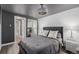 Stylish bedroom featuring soft bedding, mirrored closet doors, and contemporary lighting at 1390 N Emerson St # 101, Denver, CO 80218
