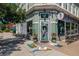 Charming commercial building exterior with sidewalk art and an inviting entryway at 1390 N Emerson St # 101, Denver, CO 80218