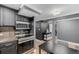 Charming kitchen featuring stainless steel appliances, and an eat-in dining area at 1390 N Emerson St # 101, Denver, CO 80218