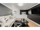 Relaxing living room with natural light, hardwood floors, and a flat screen TV at 1390 N Emerson St # 101, Denver, CO 80218