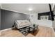 Cozy living room featuring hardwood floors, and a stylish area rug at 1390 N Emerson St # 101, Denver, CO 80218