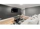 Well-lit living room featuring hardwood floors, and a stylish area rug at 1390 N Emerson St # 101, Denver, CO 80218