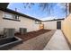 Backyard featuring new landscaping and a detached garage at 3313 Jasmine St, Denver, CO 80207