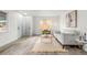 Inviting living space featuring modern furnishings, a neutral color scheme, and ample natural light at 3313 Jasmine St, Denver, CO 80207