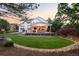 Wide view of backyard and deck with covered patio, plenty of space for activities at 16658 Black Oak Ct, Parker, CO 80134