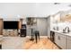 Finished basement featuring a wet bar, arcade machine, and a large television at 16658 Black Oak Ct, Parker, CO 80134