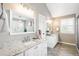 Spacious bathroom offers double sink vanity with granite countertops and ample storage at 16658 Black Oak Ct, Parker, CO 80134