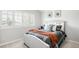 Cozy bedroom with natural light features a comfortable bed and stylish decor at 16658 Black Oak Ct, Parker, CO 80134