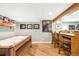 Finished basement wet bar, custom woodworking, and game area with air hockey table at 16658 Black Oak Ct, Parker, CO 80134