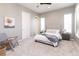 Comfortable bedroom with plush carpet, neutral tones, and plenty of natural light at 578 Sage Grouse Cir, Castle Rock, CO 80109