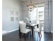 Inviting dining area features modern lighting, decor, and sliding doors to the outside at 578 Sage Grouse Cir, Castle Rock, CO 80109