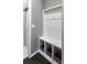 Functional entryway with built-in storage, seating, and hooks for coats and bags at 578 Sage Grouse Cir, Castle Rock, CO 80109