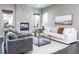 Cozy living room with a stone fireplace, plush seating, and ample natural light at 578 Sage Grouse Cir, Castle Rock, CO 80109