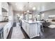 Open floor plan showcases the kitchen, dining area, and living room, perfect for entertaining at 578 Sage Grouse Cir, Castle Rock, CO 80109