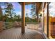Scenic back deck featuring a porch swing with beautiful views of nature at 30082 Troutdale Ridge Rd, Evergreen, CO 80439