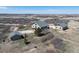 A beautiful view of the home, two outbuildings, and the surrounding landscape at 5549 Lake Gulch Rd, Castle Rock, CO 80104