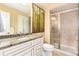 Elegant bathroom with a granite countertop vanity and glass-enclosed shower at 5549 Lake Gulch Rd, Castle Rock, CO 80104