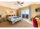 Inviting bedroom with vaulted ceiling, deck access, and picturesque outdoor views at 5549 Lake Gulch Rd, Castle Rock, CO 80104