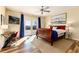 Spacious bedroom with a ceiling fan, a work desk, and patio access at 5549 Lake Gulch Rd, Castle Rock, CO 80104